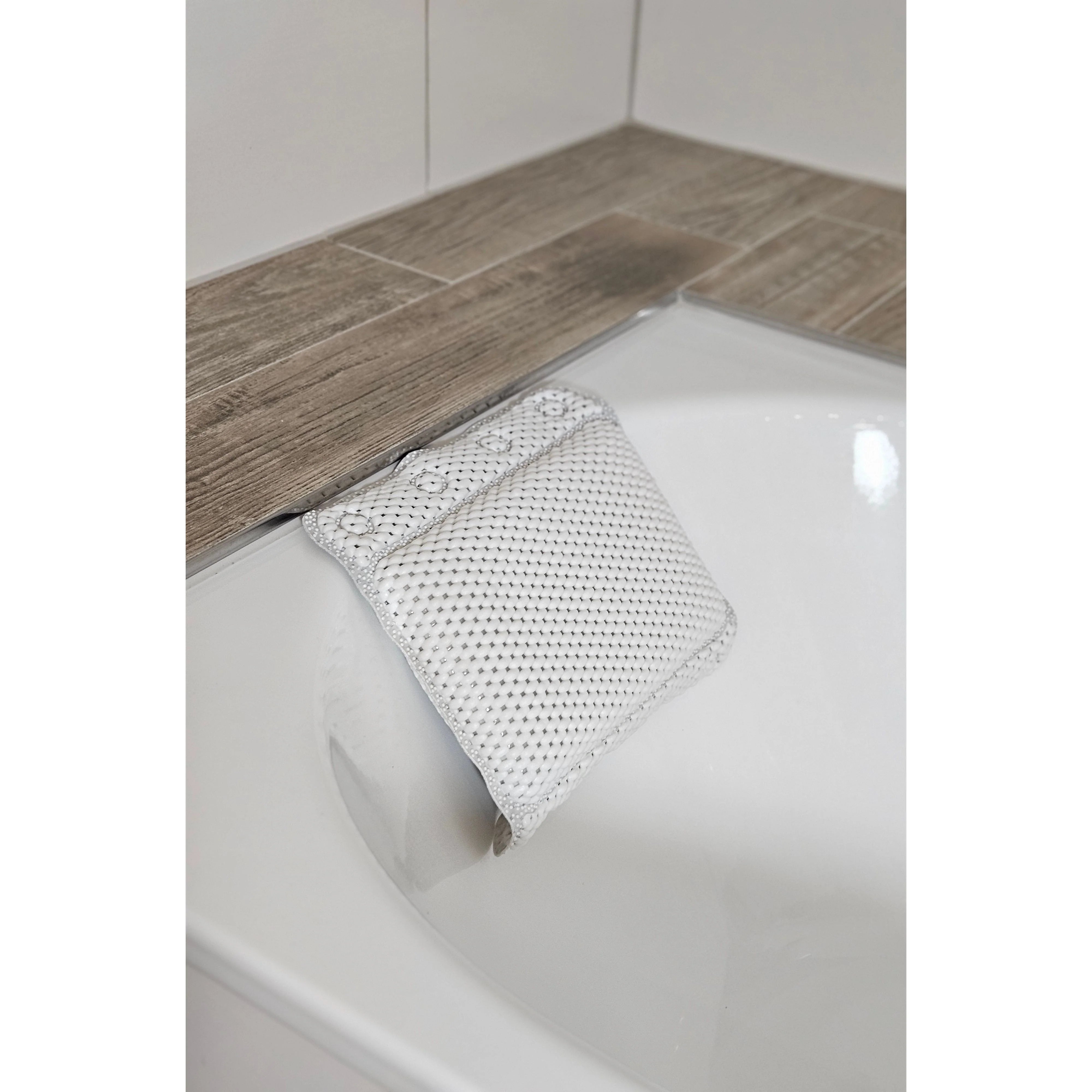 Graues Badewannenkissen mit blauen Details, geeignet für Spa-Anwendungen