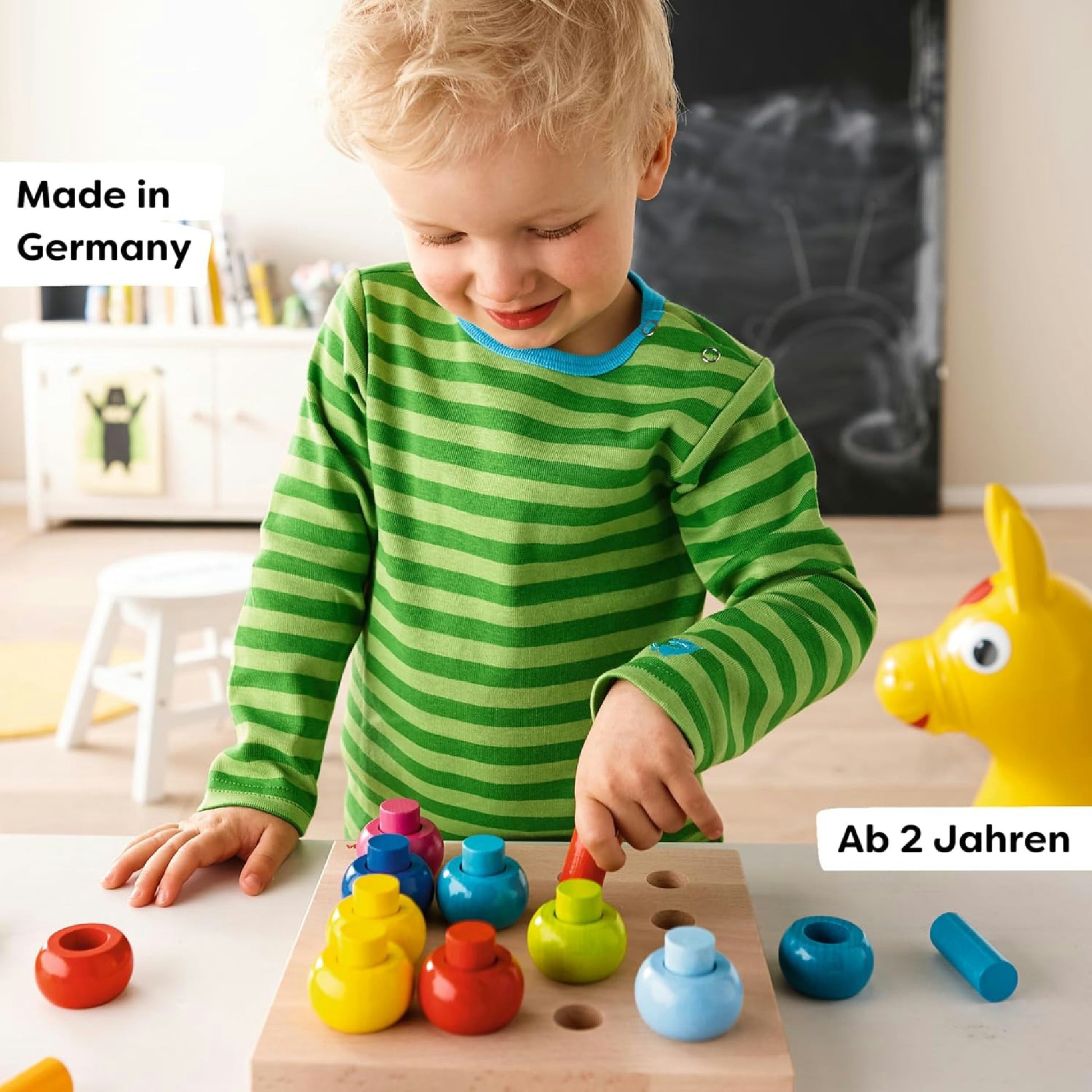 Haba 2202 - Steckspiel Farbkringel, buntes Sortier- und Motorikspielzeug aus Holz ab 2 Jahren, zum Farbenlernen Hauptansicht